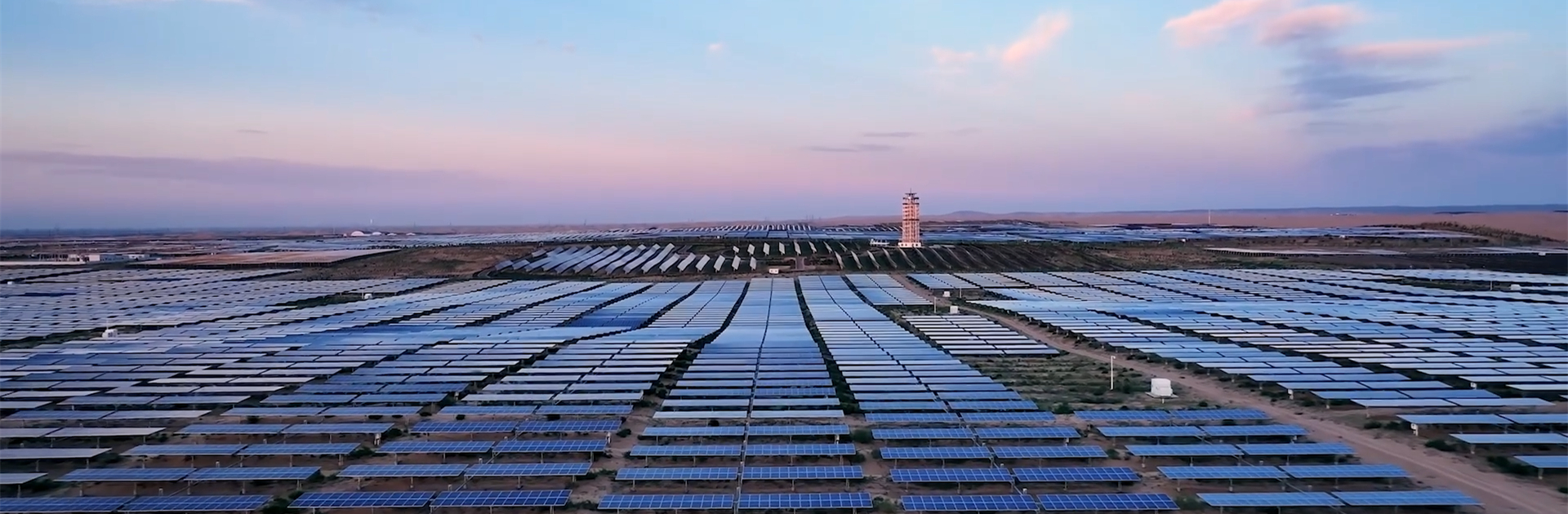 The blue 'Great Wall' rises from the desert